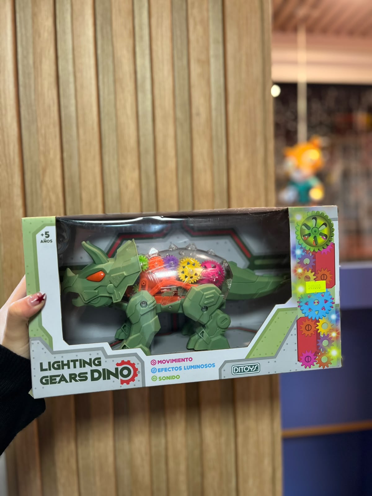 Dinosaurio Triceratops con luces.